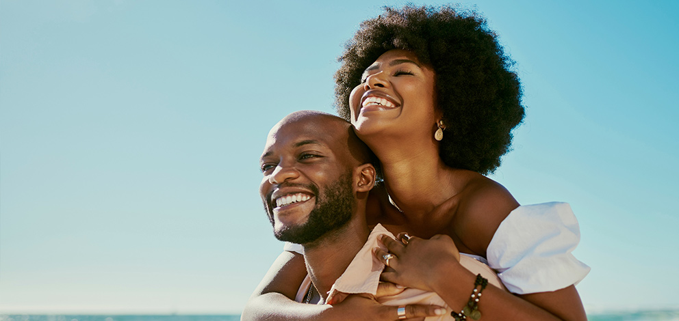 Man and woman smiling