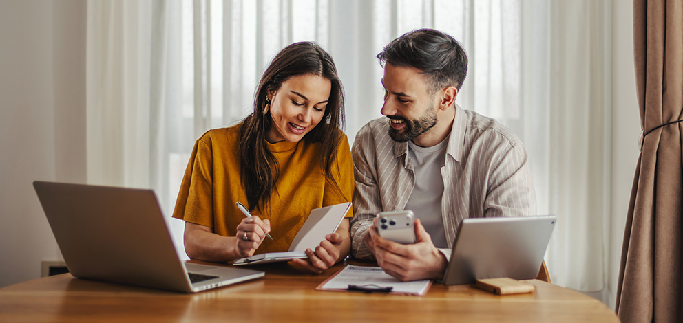 Man and woman using mobile app