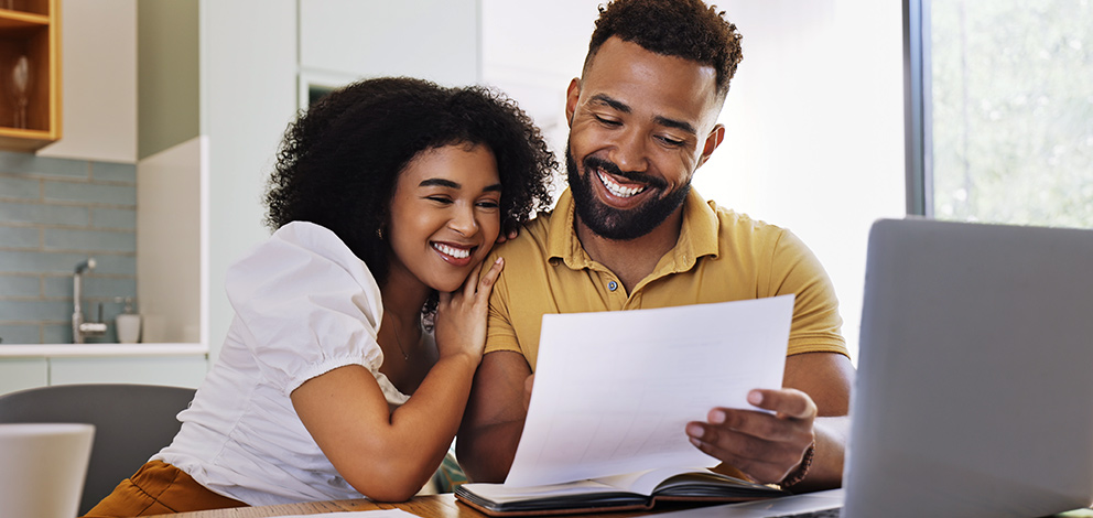 Man and woman using computer