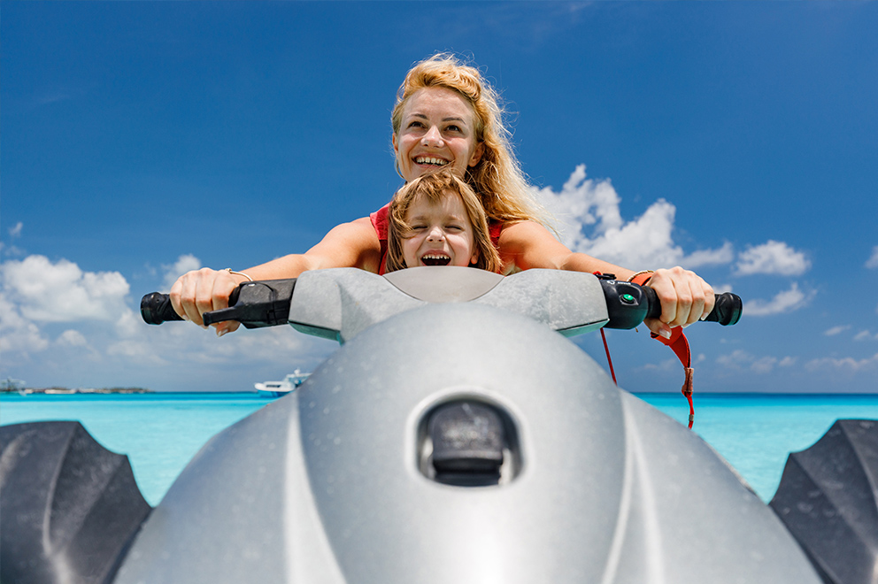 Mother and daughter on jet ski