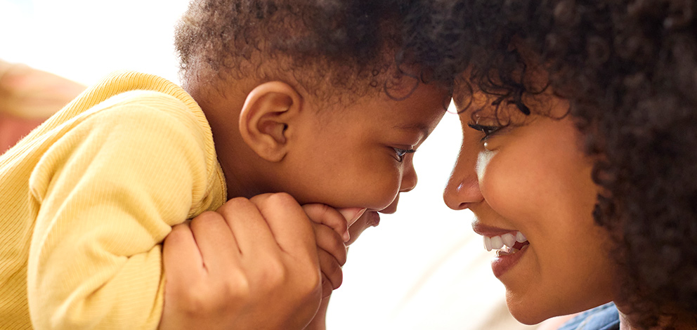 Mother and son smiling