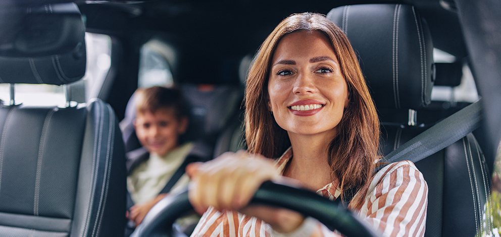 Mother and son in car