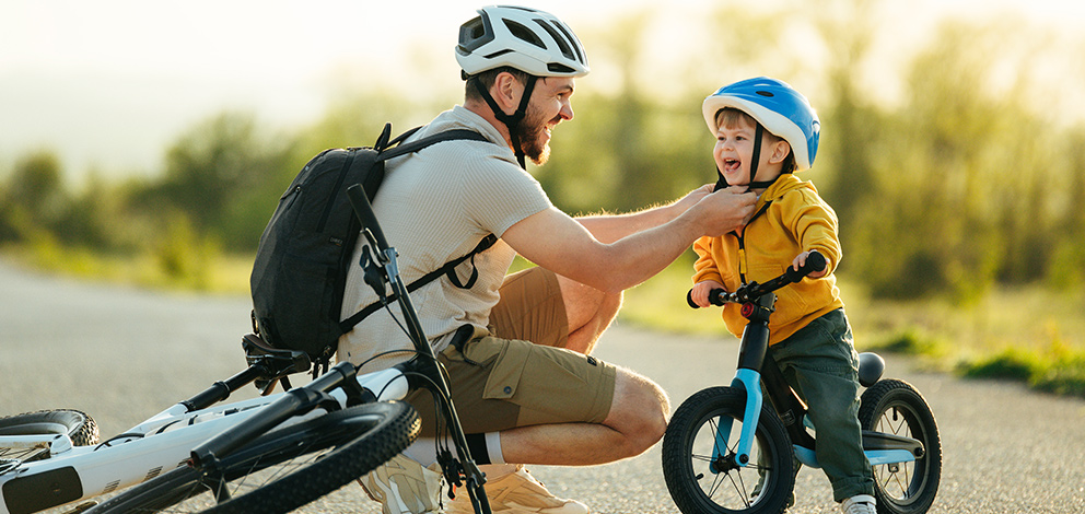 Father and son riding bikes