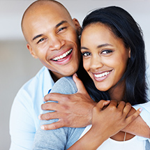 Man and woman smiling