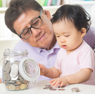 Man with baby and jar of coins